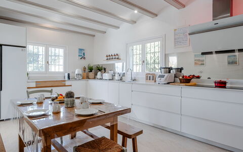 Tika: Furniture, Kitchen, Interior Design, Countertop, Flooring, Wood, Ceiling, Cabinetry, Floor, Home