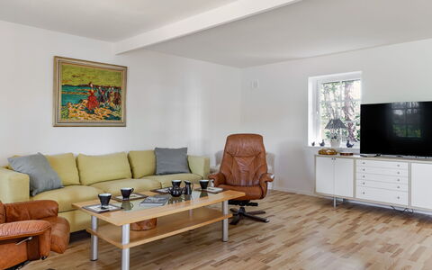 Rönnö: Furniture, Interior Design, Flooring, Couch, Wall, Floor, Wood, Living Room, Table, Room