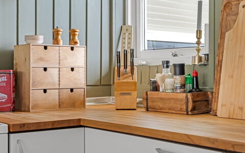 Bo - 250M from the Sea: Furniture, Kitchen, Countertop, Wood Stain, Cabinetry, Hardwood, Bottle, Drawer