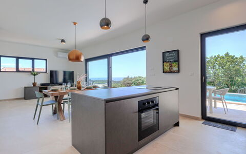 Florinda: Flooring, Floor, Countertop, Kitchen, Home, Ceiling, Chair, Cabinetry, Home Appliance, Houseplant