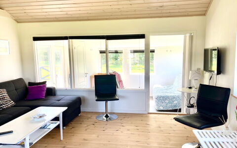 Annelouise - 180M to the Fjord: Furniture, Wood, Interior Design, Flooring, Floor, Chair, Room, Ceiling, Living Room, Apartment
