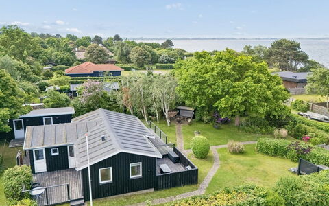 Marillia - 75M from the Sea: Residential Area, House, Home, Landscape, Roof, Estate, Cottage, Landscaping, Suburb, Lawn