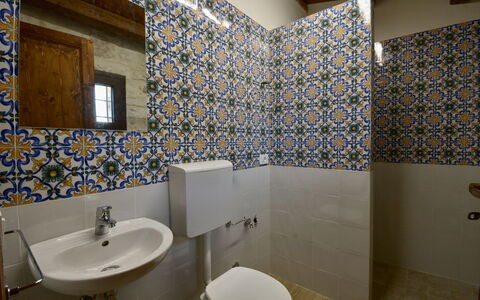 Villa Palmento: Flooring, Bathroom, Floor, Tile, Plumbing Fixture, Interior Design, Mosaic, Toilet Seat, Plumbing, Toilet