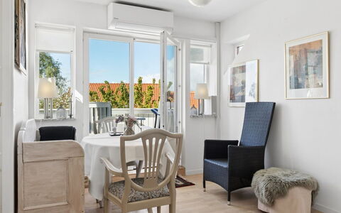 Arnke - 300M from the Sea: Furniture, Outdoor Furniture, Tableware, Table, Drinkware, Chair, Outdoor Table, Food, Bottle