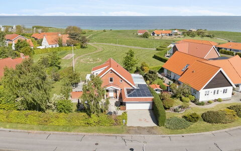 Arnke - 300M from the Sea: Furniture, Outdoor Furniture, Tableware, Table, Drinkware, Chair, Outdoor Table, Food, Bottle