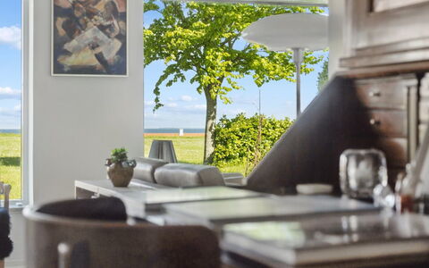 Arnke - 300M from the Sea: Furniture, Outdoor Furniture, Tableware, Table, Drinkware, Chair, Outdoor Table, Food, Bottle
