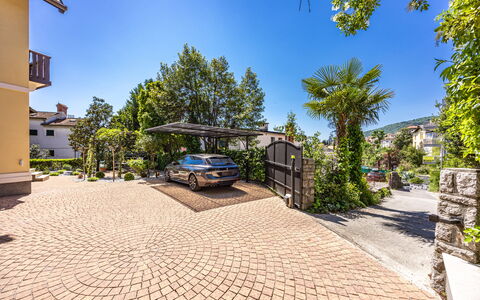 Apartment Noa Opatjia: Residential Area, Driveway, Garden, Estate, Landscaping, Suburb, Flagstone, Shade, Hacienda, Mansion
