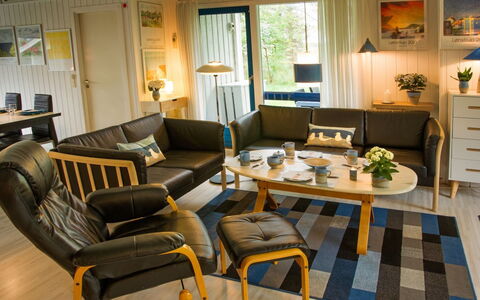 Nis - 900M from the Sea: Furniture, Interior Design, Wood, Couch, Living Room, Flooring, Lighting, Floor, Room, Home
