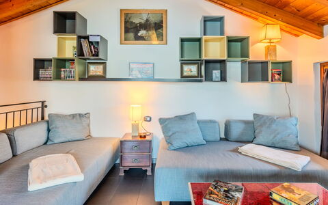 La Torre a Dorio: Furniture, Interior Design, Wall, Couch, Flooring, Room, Ceiling, Wood, Floor, Living Room