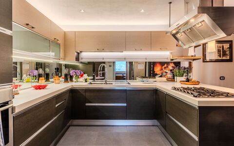 La Torre a Dorio: Kitchen, Countertop, Kitchen Appliance, Major Appliance, Interior Design, Kitchen Stove, Cabinetry, Flooring, Ceiling, Lighting
