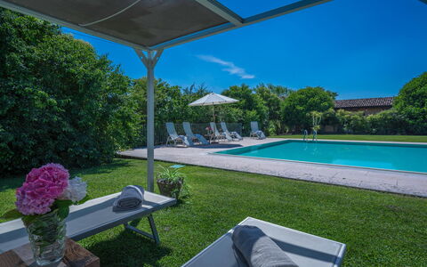 Preseglie Lake Garda: Swimming Pool, Garden, Shade, Estate, Landscaping, Resort, Outdoor Furniture, Lawn, Yard, Hacienda