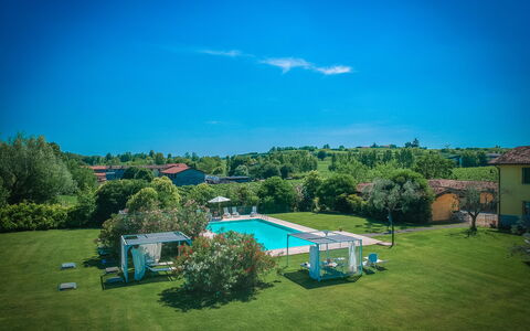 Preseglie Lake Garda: Blue, Swimming Pool, Estate, Lawn, Leisure, Resort, Eco Hotel, Landscaping, Hacienda, Park