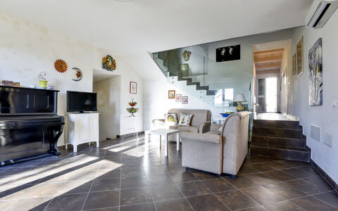 Tenuta Renna: Flooring, Interior Design, Floor, Furniture, Ceiling, Lighting, Couch, Room, Living Room