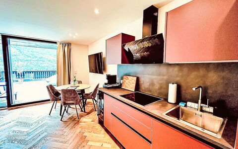 Alpenzeit: Flooring, Interior Design, Furniture, Floor, Apartment, Kitchen, Countertop, Wood Stain, Cabinetry, Hardwood