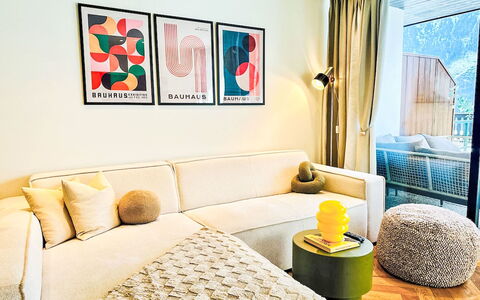 Alpenzeit: Furniture, Interior Design, Couch, Wall, Flooring, Living Room, Floor, Room, Yellow, Textile