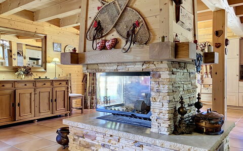 La Suisse Normande: Furniture, Wood, Interior Design, Ceiling, Home, Hearth, Flooring, Room, Chair, Living Room