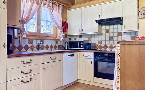 La Suisse Normande: Kitchen, Wood, Cabinetry, Interior Design, Kitchen Appliance, Countertop, Flooring, Major Appliance, Furniture, Drawer