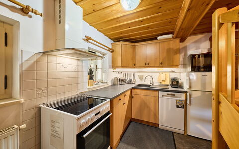 Rustic Lodge: Wood, Kitchen, Ceiling, Interior Design, Countertop, Major Appliance, Cabinetry, Floor, Room, Sink