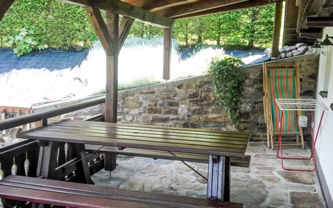 Rustic Lodge: Furniture, Wood, Outdoor Furniture, Table, Outdoor Table, Chair, Hardwood, Wood Stain, Outdoor Structure, Porch
