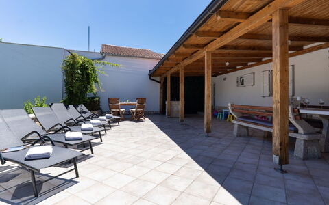 Hidden Hill: Furniture, Outdoor Furniture, Floor, Flooring, Composite Material, Chair, Shade, Outdoor Table, Swimming Pool, Wood Stain
