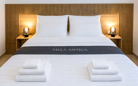 Antica: Bed, Bedroom, Furniture, Interior Design, Wood, Bedding, Bed Sheet, Floor, Throw Pillow, Bed Frame