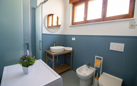 Sweet Dreams Home in Otranto: Flooring, Wood, Floor, Interior Design, Plumbing Fixture, Bathroom Sink, Sink, Tap, Bathroom, Lighting