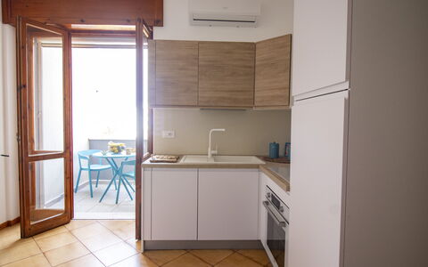 Sweet Dreams Home in Otranto: Kitchen, Furniture, Kitchen Appliance, Interior Design, Flooring, Major Appliance, Wood, Floor, Countertop, Cabinetry