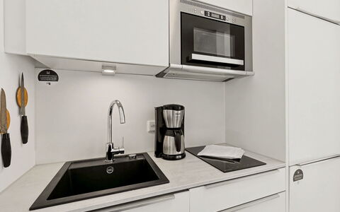 Seebrise: Kitchen, Countertop, Kitchen Appliance, Cabinetry, Interior Design, Wood, Flooring, Major Appliance, Home Appliance, Furniture