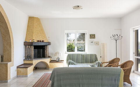 Tarquinia Garden Home: Furniture, Interior Design, Flooring, Wall, Floor, Wood, Ceiling, Room, Chair, Living Room