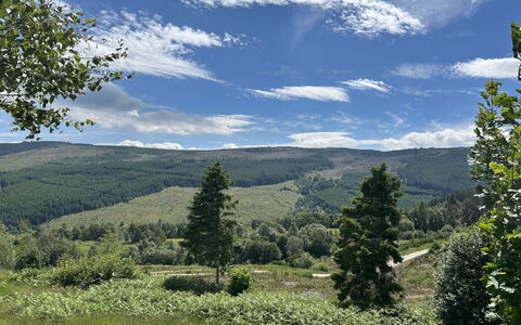 Highland Hillside Retreat: Sky, Mountainous Landforms, Cloud, Natural Environment, Nature, Hill, Green, Mountain, Vegetation, Natural Landscape