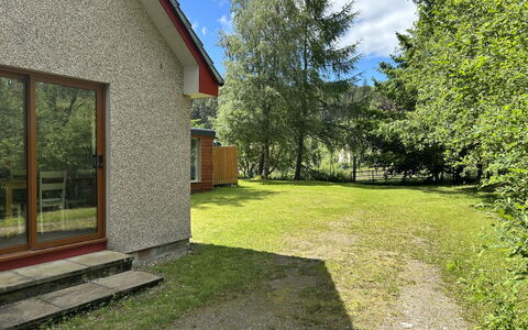 Highland Hillside Retreat: Shrub, Cottage, Home, Garden, Lawn, Farmhouse, Yard, Landscaping, Garden Buildings, Backyard