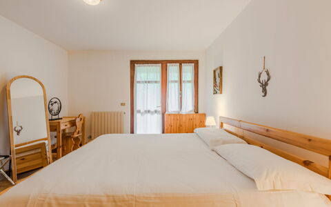Lo Chalet del Bepy: Bed, Bedroom, Interior Design, Furniture, Bedding, Bed Sheet, Wall, Wood, Flooring, Floor