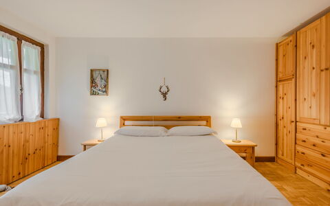 Lo Chalet del Bepy: Bed, Furniture, Bedroom, Bedding, Interior Design, Bed Sheet, Wood, Floor, Flooring, Ceiling