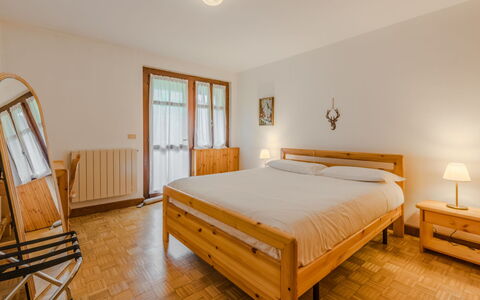 Lo Chalet del Bepy: Bed, Furniture, Bedroom, Interior Design, Bedding, Bed Sheet, Floor, Wood, Flooring, Room