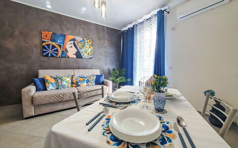 Siciliandò: Furniture, Interior Design, Flooring, Table, Floor, Room, Textile, Lighting, Couch, Ceiling