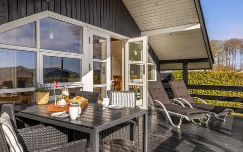 Uuno - 200M from the Sea: Furniture, Outdoor Furniture, Tableware, Table, Drinkware, Chair, Outdoor Table, Food, Bottle
