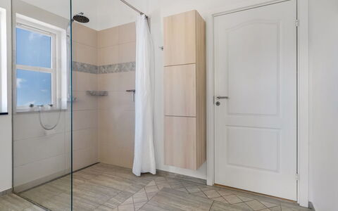 Vaska - 75M from the Sea: Flooring, Floor, Wood, Interior Design, Door, Plumbing Fixture, Bathroom, Tile, Wood Flooring, Composite Material