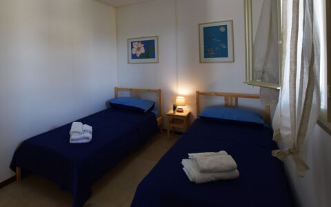Villa Andrea: Furniture, Wood, Floor, Flooring, Interior Design, Bedroom, Bed, Room, Bed Frame, Bed Sheet