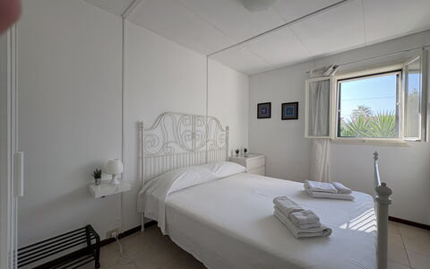 Villa Andrea: Floor, Flooring, Home, Bedroom, Bed, Furniture, Apartment, Bedding, Ceiling, Bed Frame