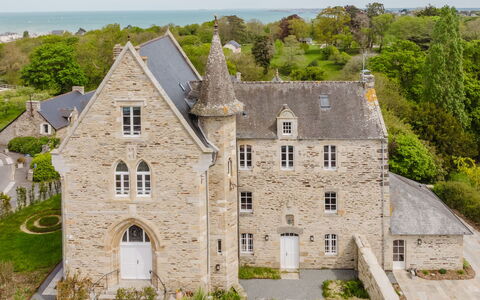 Domaine de Saint Cast: Furniture, Balcony, Shade, Garden, Outdoor Furniture, Chair, Porch, Yard, Landscaping, Backyard