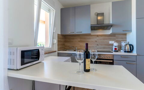 Rab Lopar 115: Countertop, Kitchen, Furniture, Interior Design, Kitchen Appliance, Cabinetry, Flooring, Major Appliance, Wood, Floor