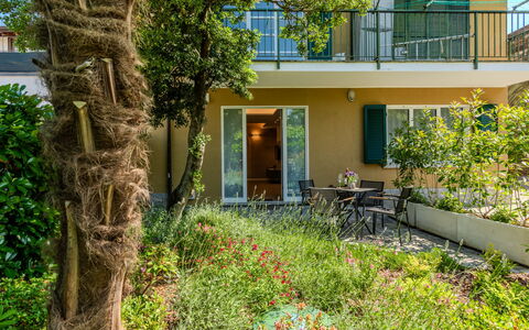 Renza: Shrub, Home, Balcony, Garden, Shade, Estate, Yard, Porch, Landscaping, Villa