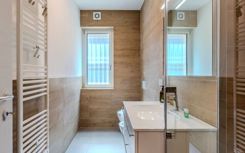 Renza: Flooring, Floor, Interior Design, Bathroom, Wall, Plumbing Fixture, Wood, Sink, Bathroom Sink, Bathroom Cabinet