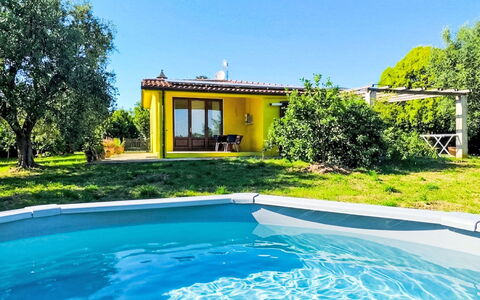 Cottage Girasole di Mare: Furniture, Interior Design, Flooring, Chair, Floor, Table, Kitchen & Dining Room Table, Shade, Ceiling, Wood Stain