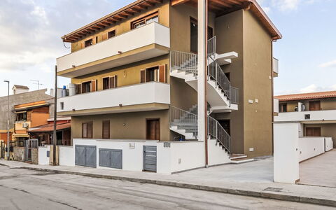 Marina di Sorso 5: Furniture, Interior Design, Flooring, Chair, Floor, Table, Kitchen & Dining Room Table, Shade, Ceiling, Wood Stain