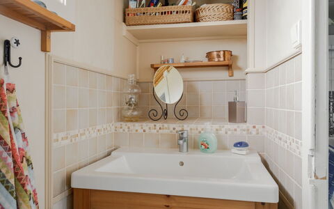 Grönadal: Bathroom Sink, Interior Design, Flooring, Plumbing Fixture, Floor, Bathroom, Sink, Bathroom Cabinet, Plumbing, Tap
