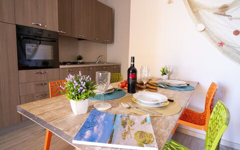 Mediterranea'S House Otranto: Furniture, Interior Design, Flooring, Wood, Floor, Room, Textile, Lighting, Table, Dining Room