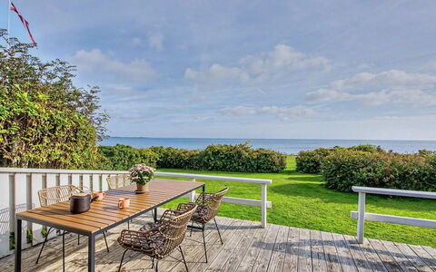 Edla - 35M from the Sea: Sky, Furniture, Wood, Outdoor Furniture, Table, Chair, Cloud, Outdoor Table, Hardwood, Plank