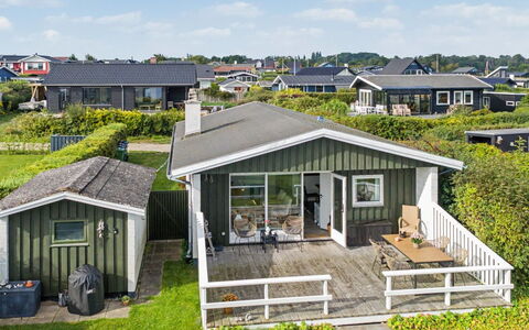 Edla - 35M from the Sea: Sky, Furniture, Wood, Outdoor Furniture, Table, Chair, Cloud, Outdoor Table, Hardwood, Plank
