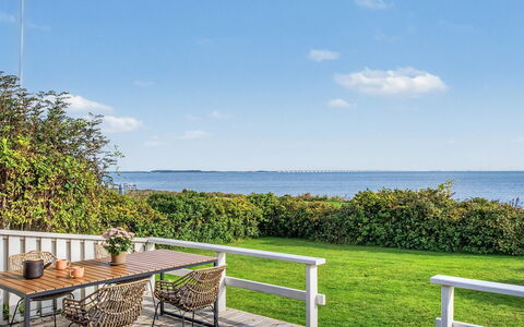 Edla - 35M from the Sea: Sky, Furniture, Wood, Outdoor Furniture, Table, Chair, Cloud, Outdoor Table, Hardwood, Plank
